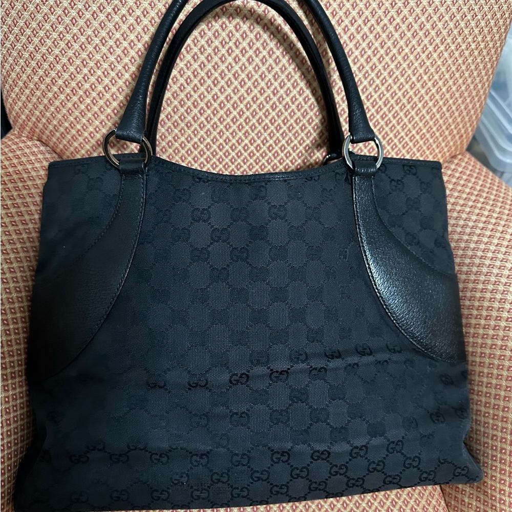 Gucci Black Leather Detail with Logo Pattern